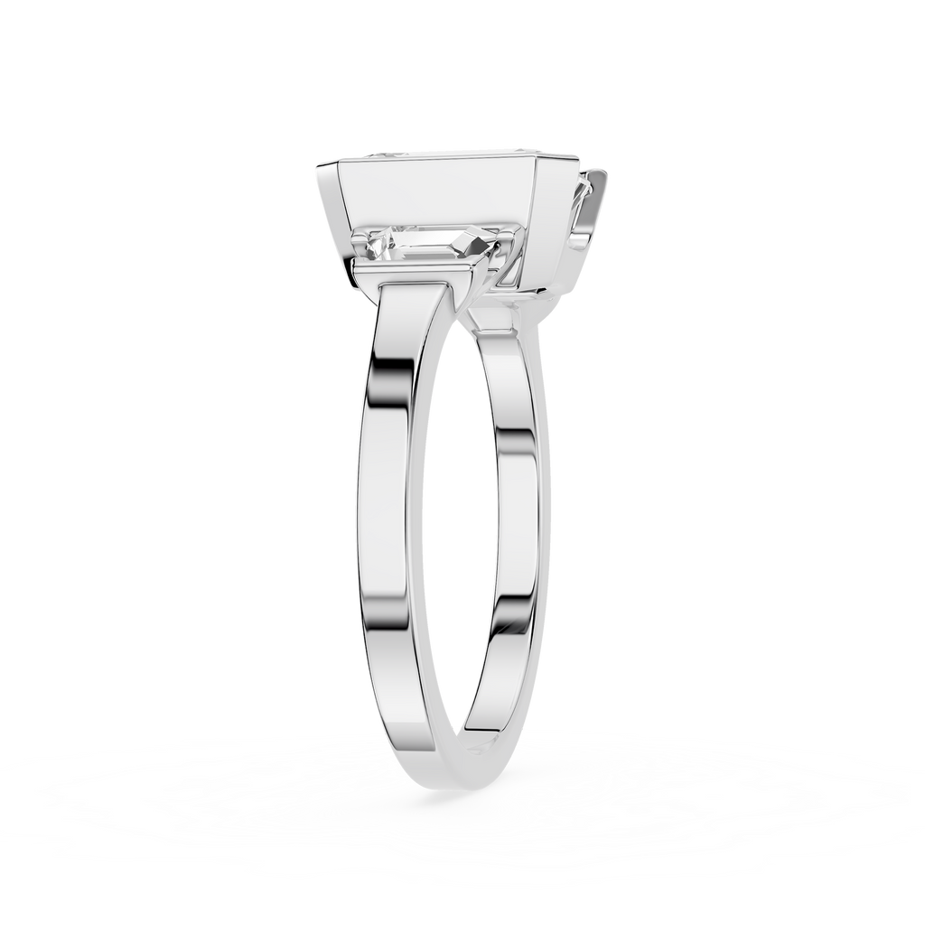 Silver ring with a rectangular gemstone on a white background