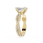 Gold ring with a diamond on a white background