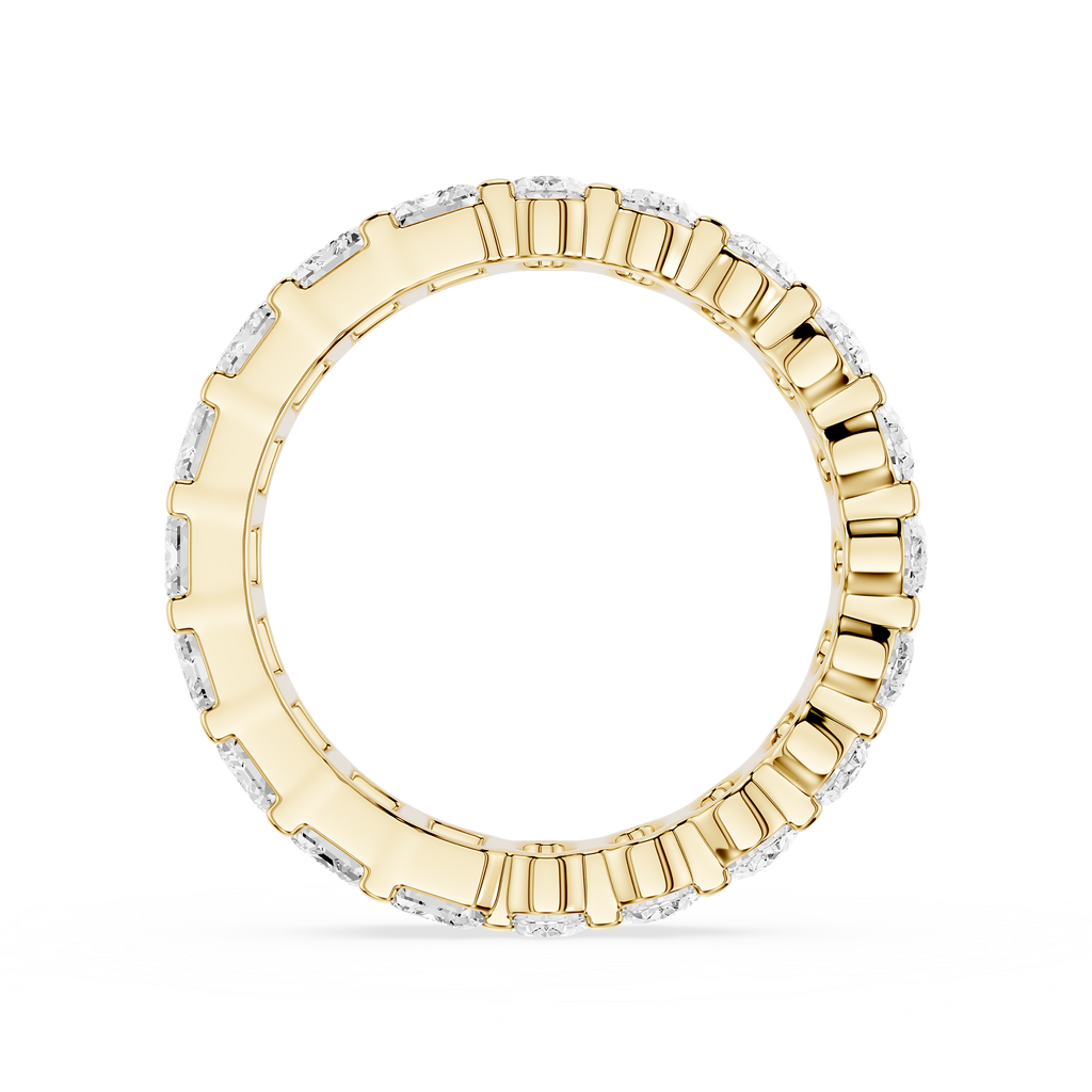 Gold ring with diamond accents on a white background