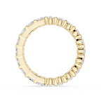 Gold ring with diamond accents on a white background