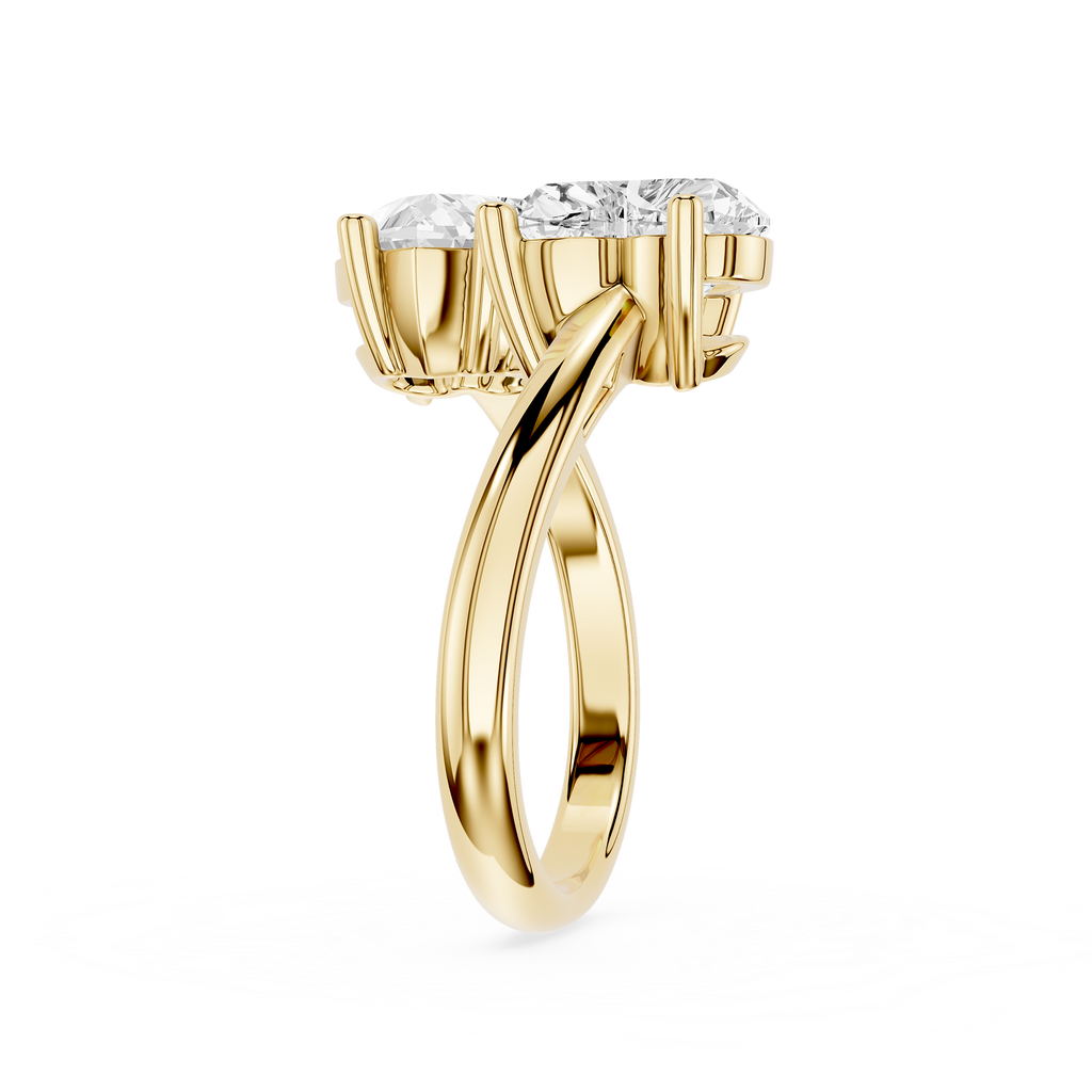Yellow gold ring with two diamonds on a white background