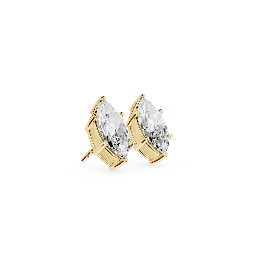 Rose gold earrings with clear gemstones on a white background