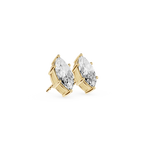 Rose gold earrings with clear gemstones on a white background