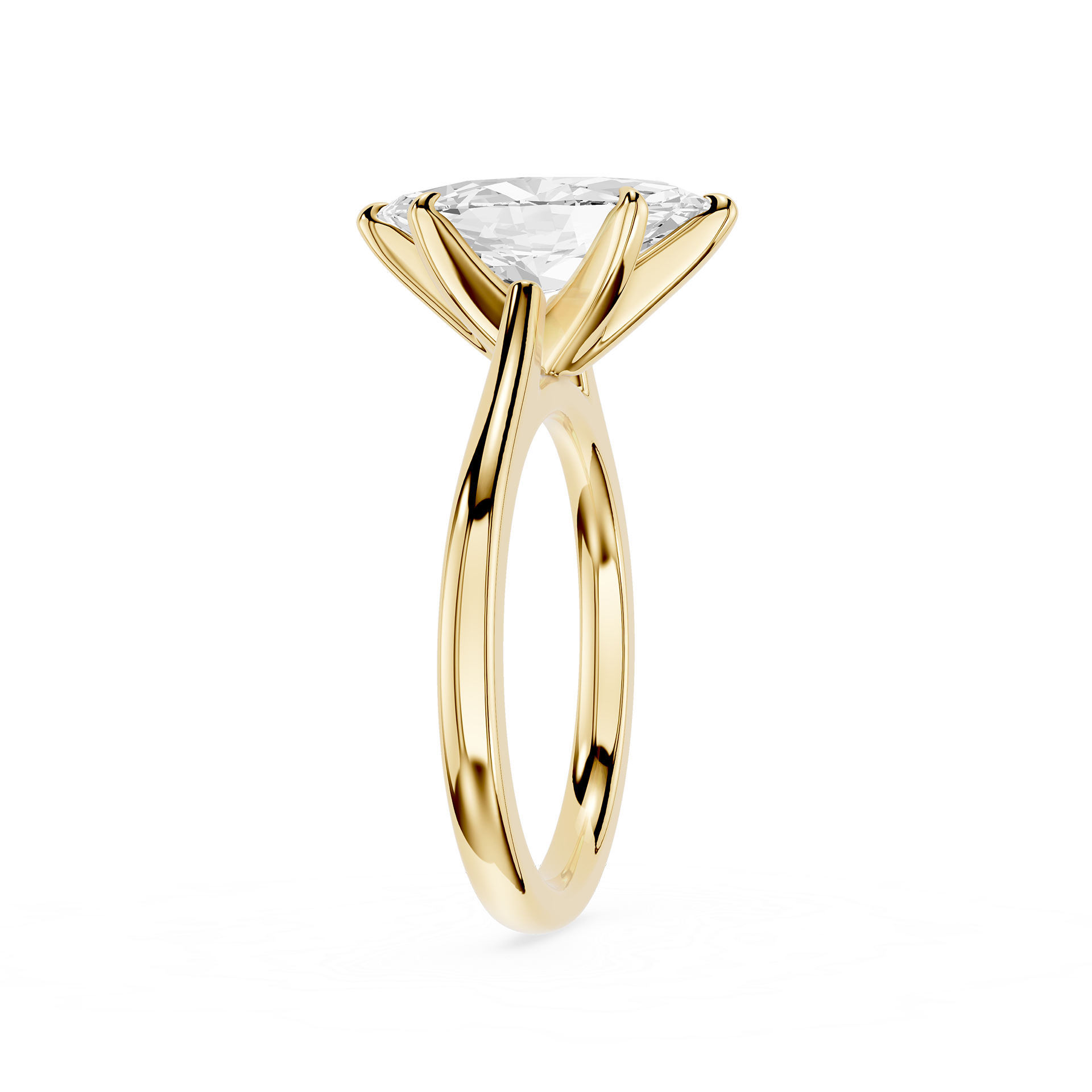 Gold ring with a clear gemstone on a white background