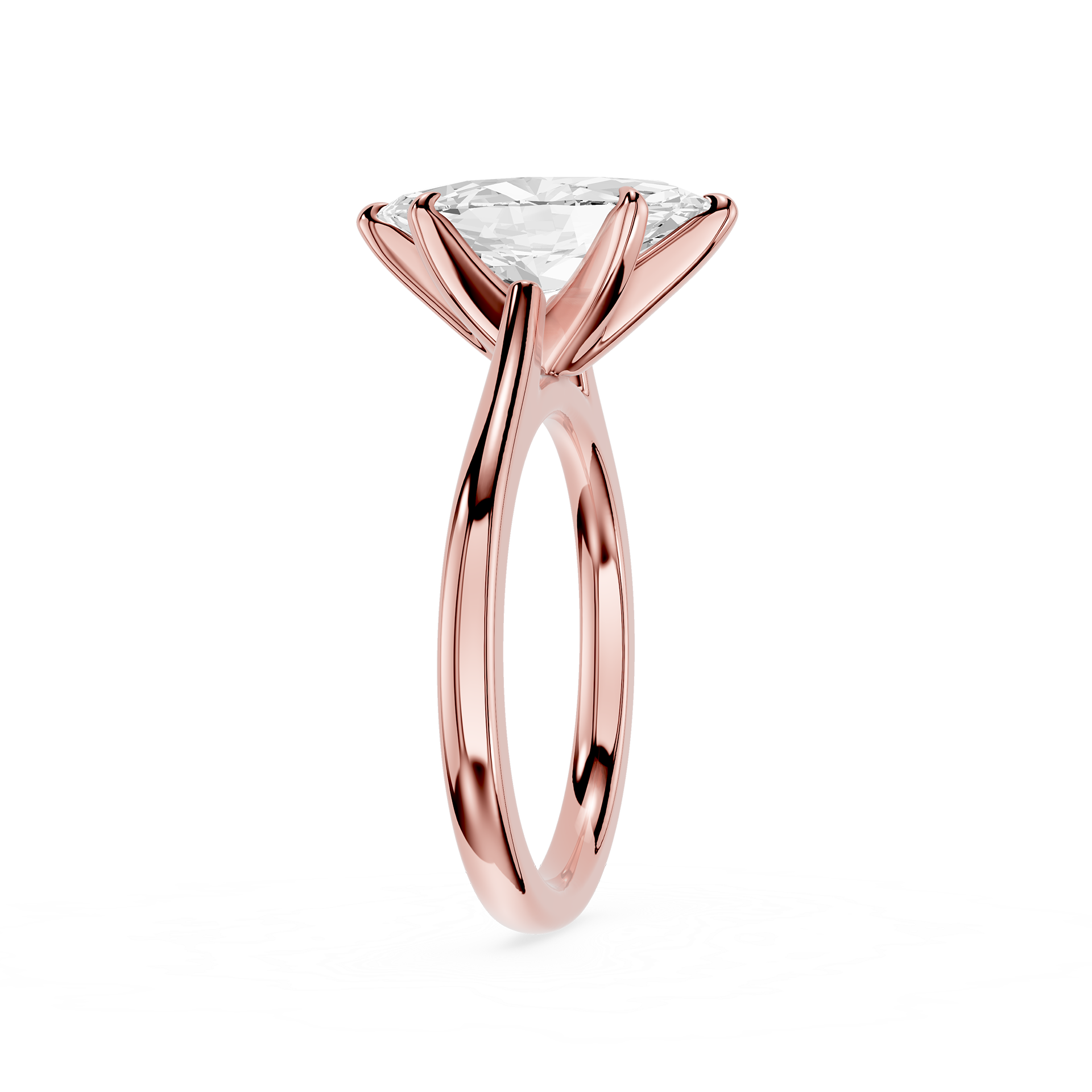 Rose gold ring with a clear gemstone on a white background