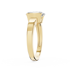 Gold ring with a diamond on a white background