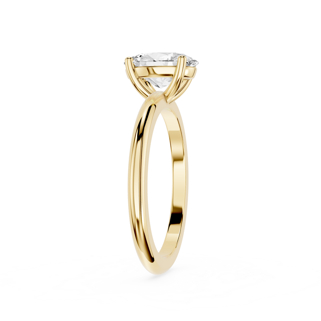 Gold ring with a diamond on a white background