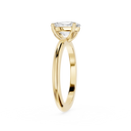 Gold ring with a diamond on a white background