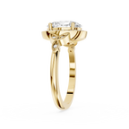 Gold ring with a diamond on a white background