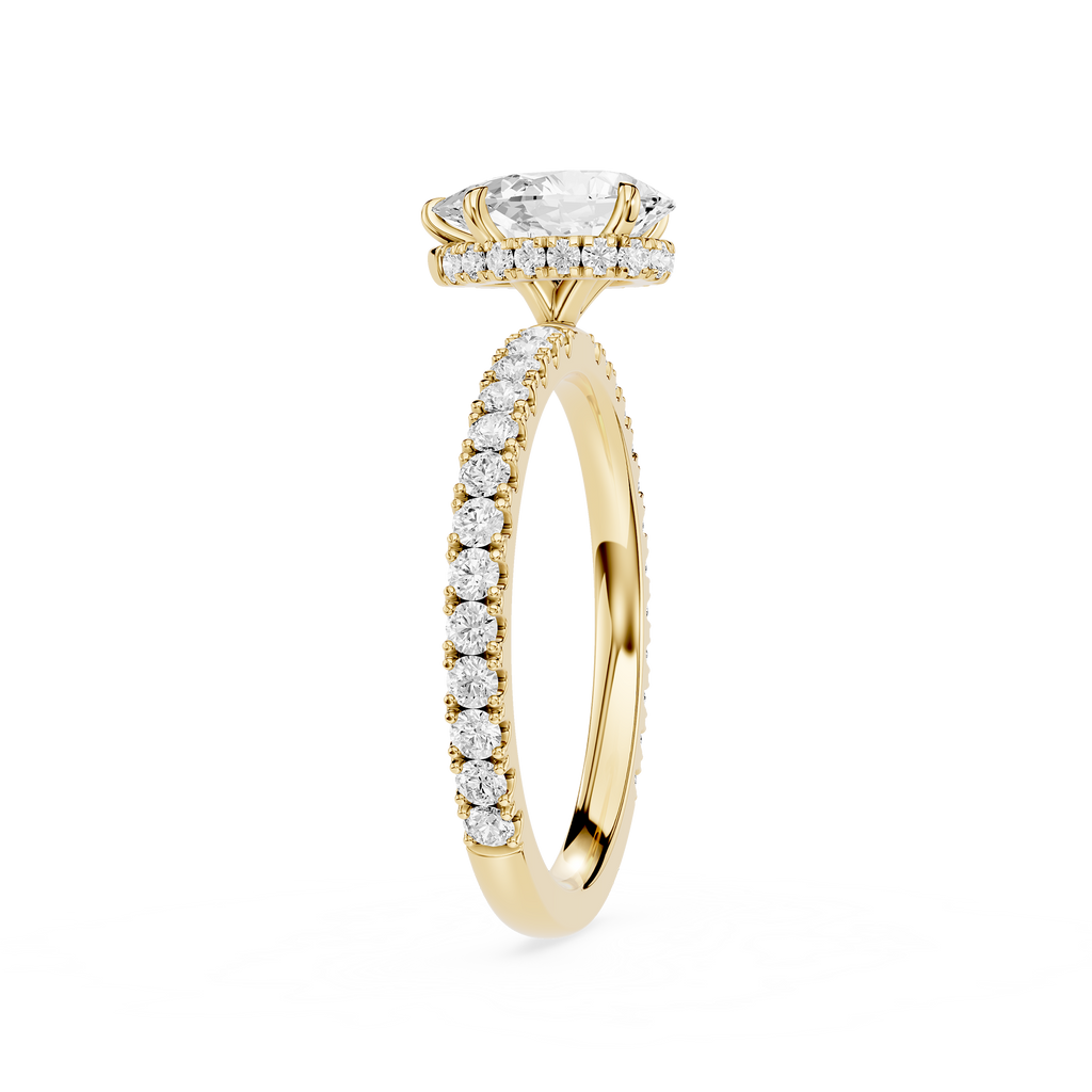 Gold ring with diamond accents on a white background