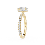 Gold ring with diamond accents on a white background
