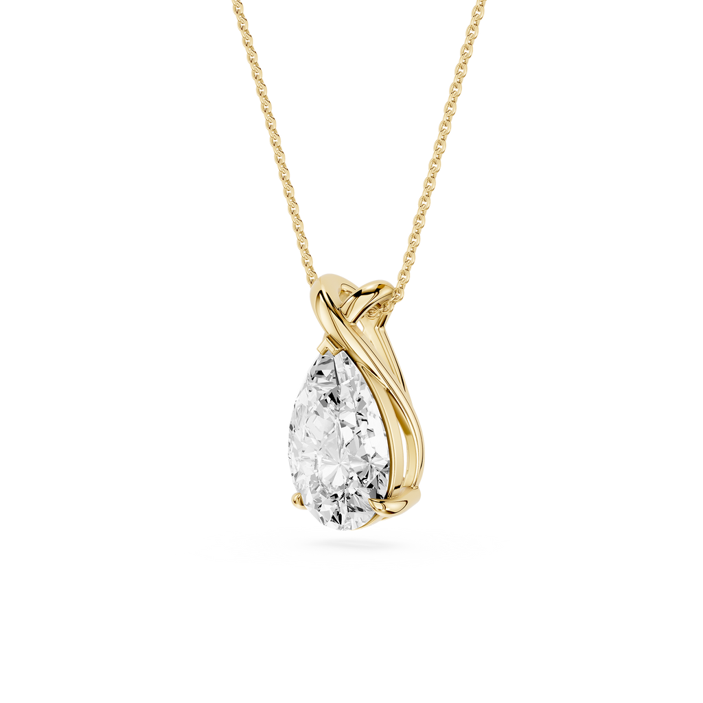 Gold necklace with a teardrop-shaped diamond pendant on a white background