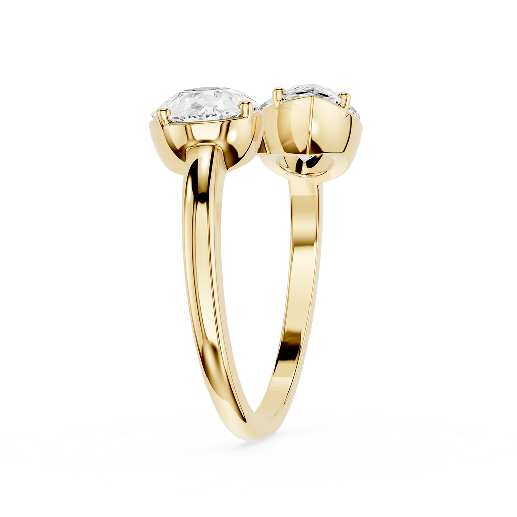 Gold ring with two diamonds on a white background