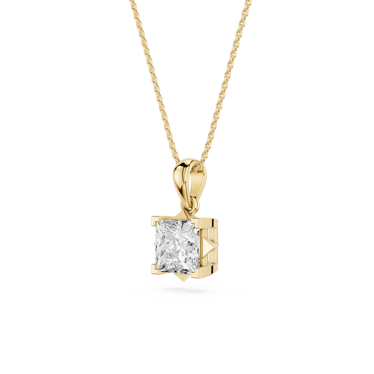 Gold pendant with a diamond on a white background