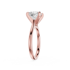 Rose gold ring with a diamond on a white background