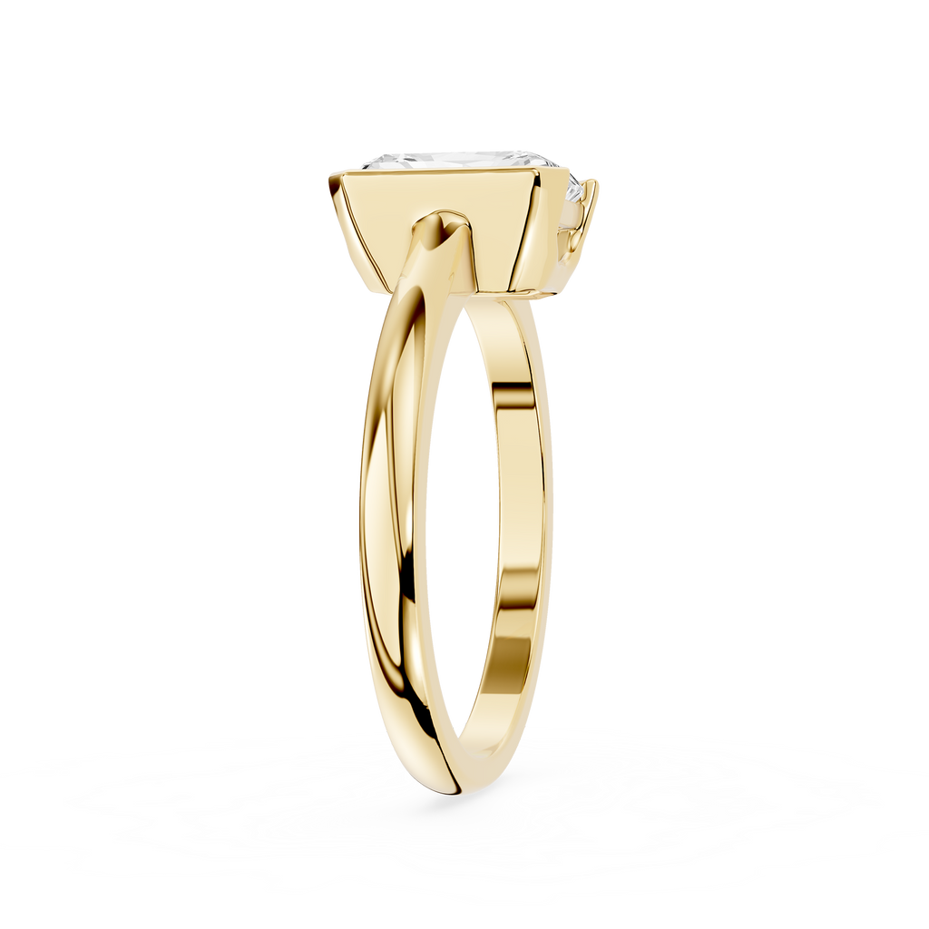 Gold ring with a diamond on a white background