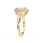Gold ring with a diamond on a white background
