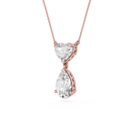 Rose gold necklace with heart and teardrop diamond pendants on a white background