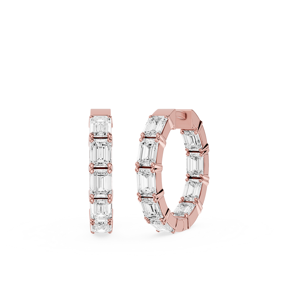 Rose gold hoop earrings with clear gemstones on a white background