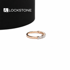 Mixed cut lab diamond band in rose gold showcasing baguette and round diamonds arranged across a polished ring