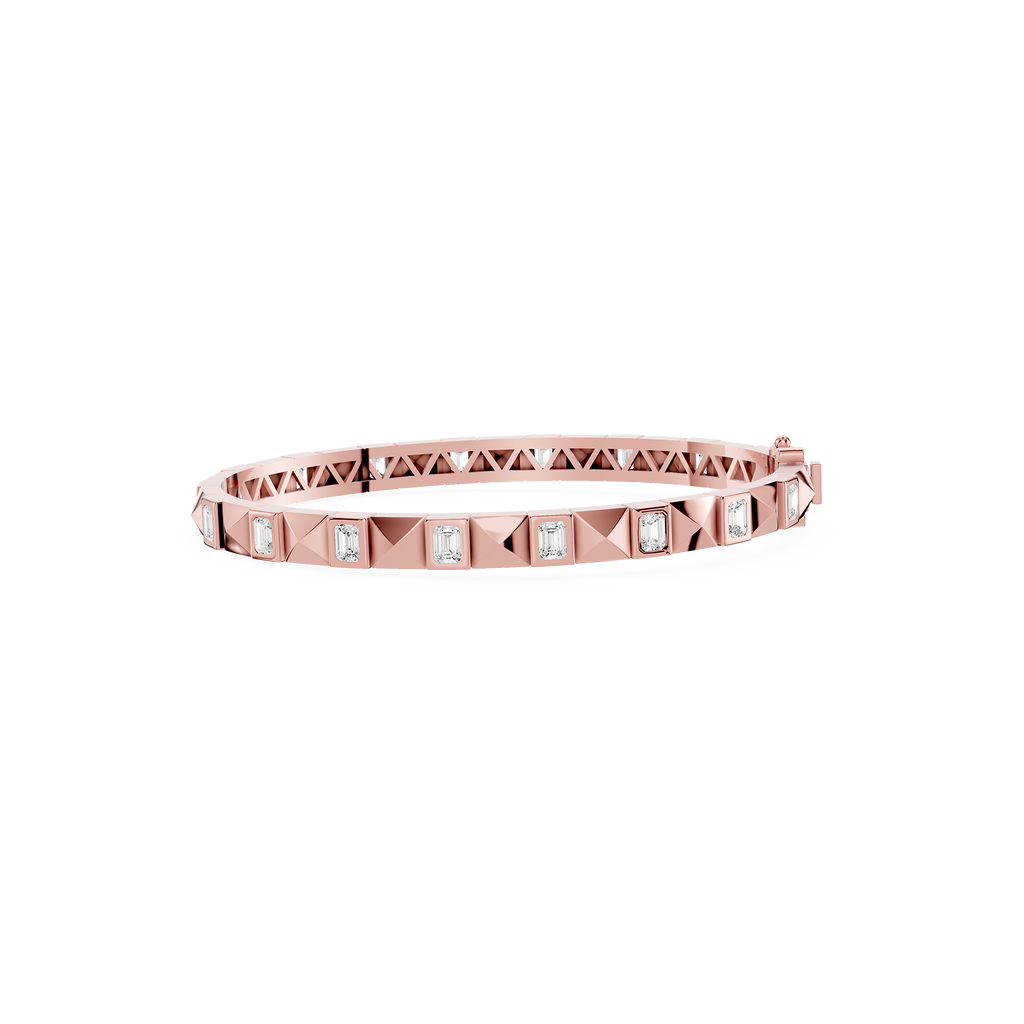 Rose gold bracelet with diamond accents on a white background