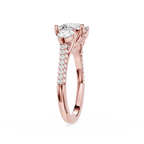Rose gold ring with a diamond on a white background