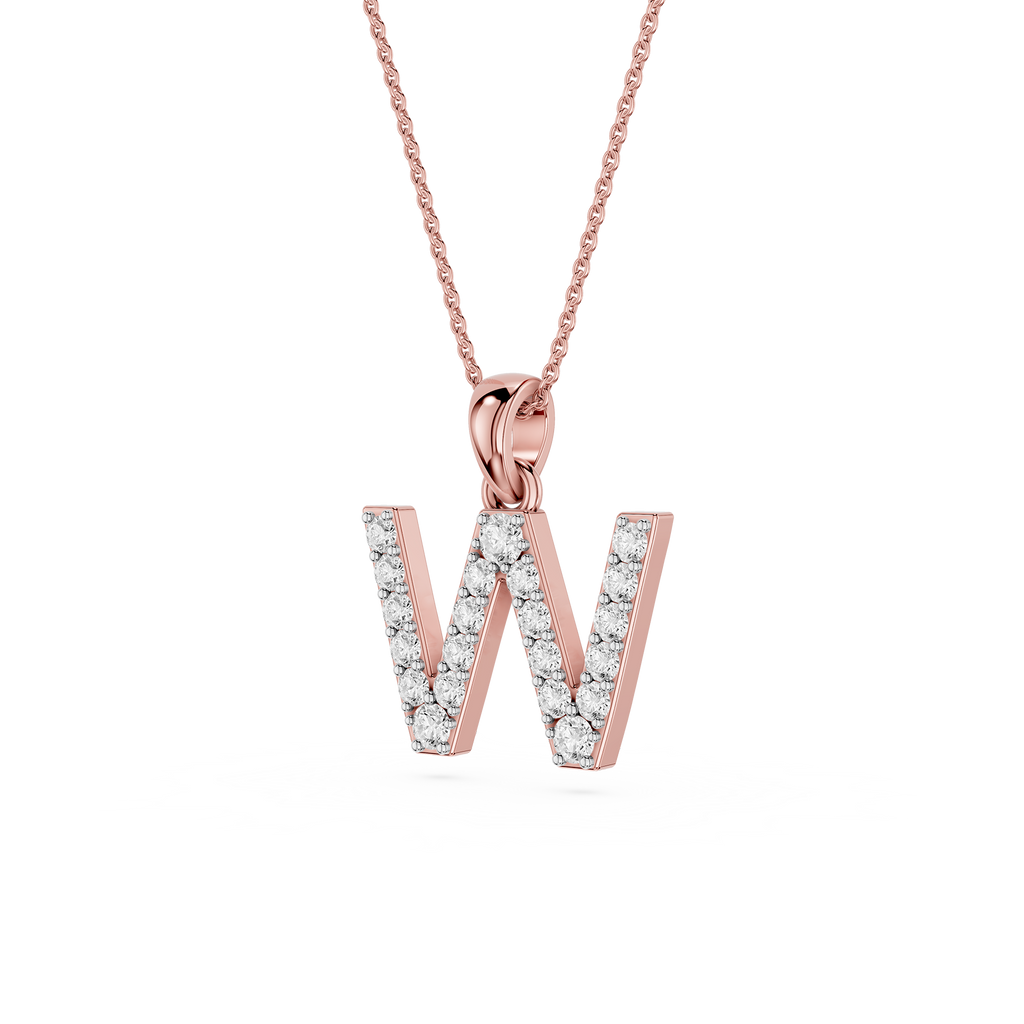 Rose gold necklace with a diamond-studded letter 'W' pendant on a white background