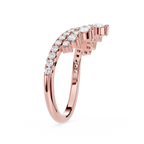 Rose gold ring with diamonds on a white background
