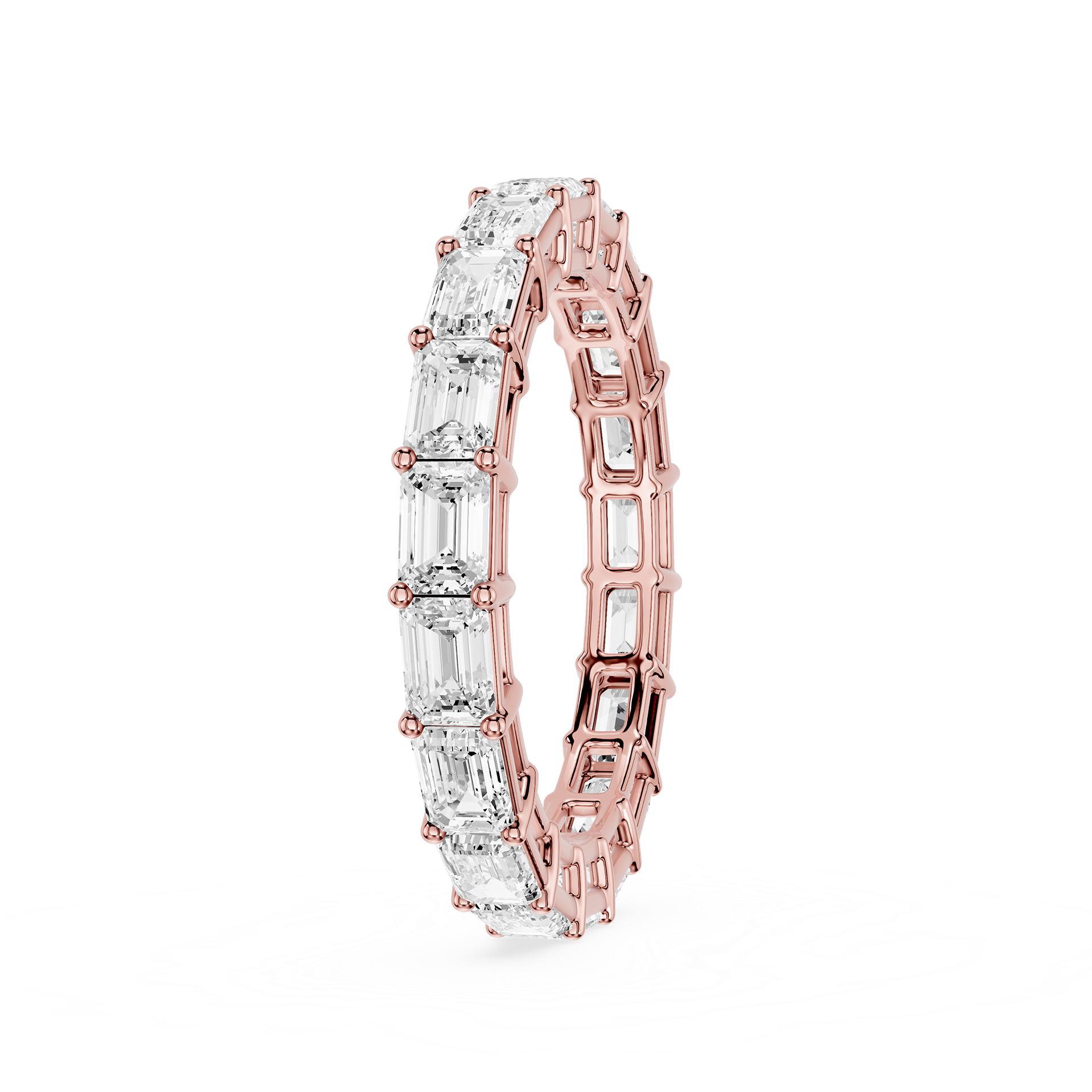 A rose gold eternity ring featuring a continuous row of clear baguette-cut gemstones, shown on a solid white background.