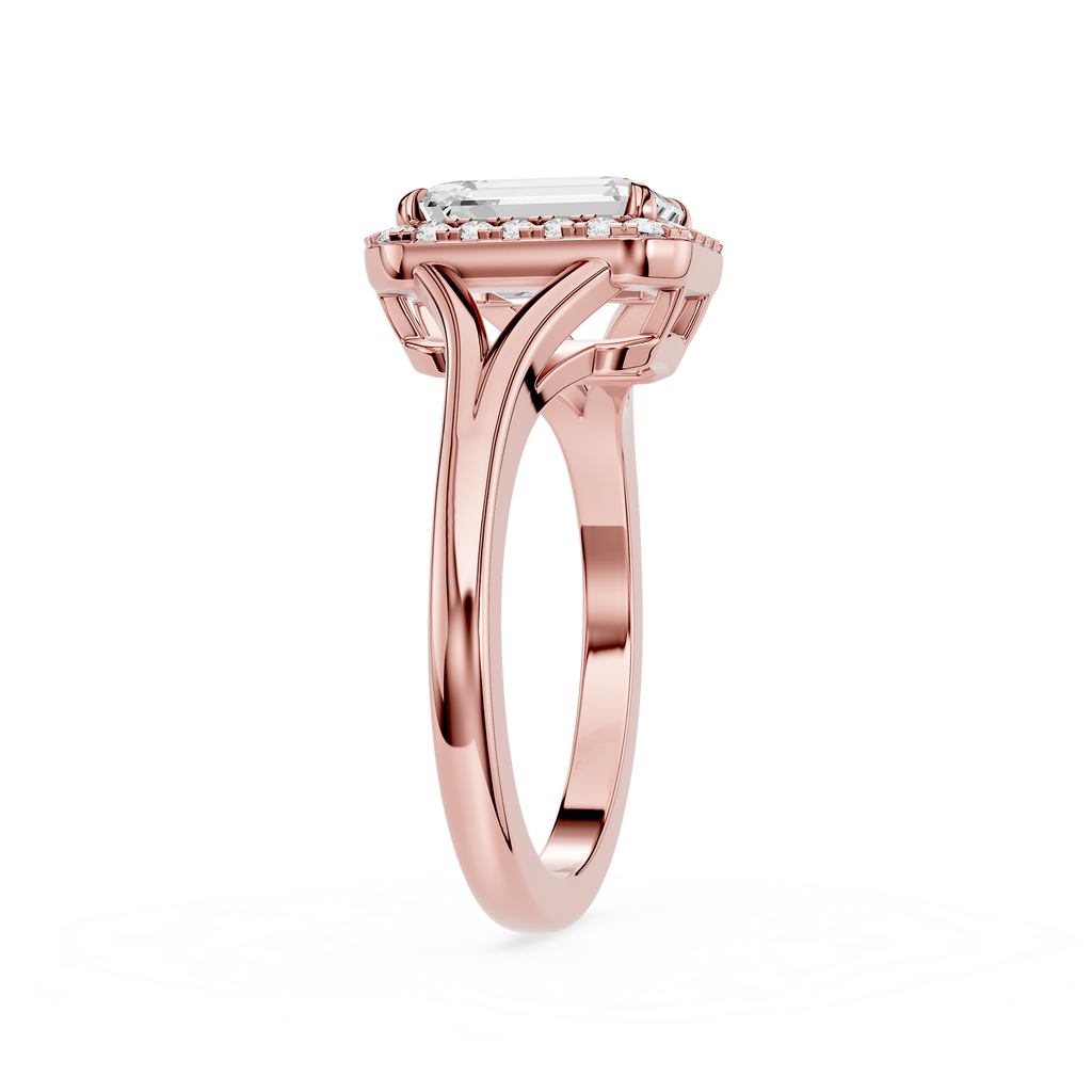 Rose gold ring with a diamond on a white background