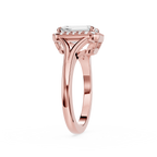 Rose gold ring with a diamond on a white background