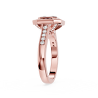 Rose gold ring with diamond accents on a white background