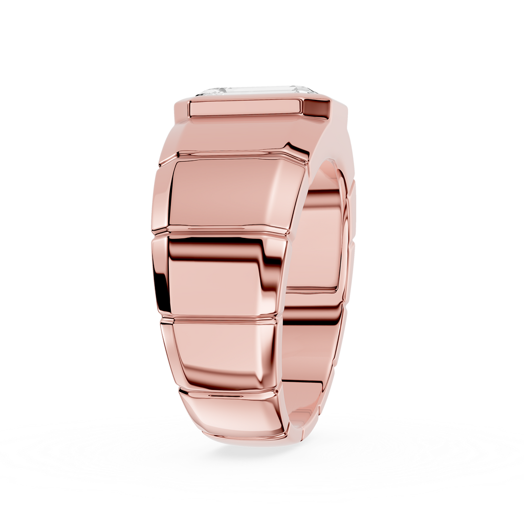 Rose gold ring with geometric design on a white background