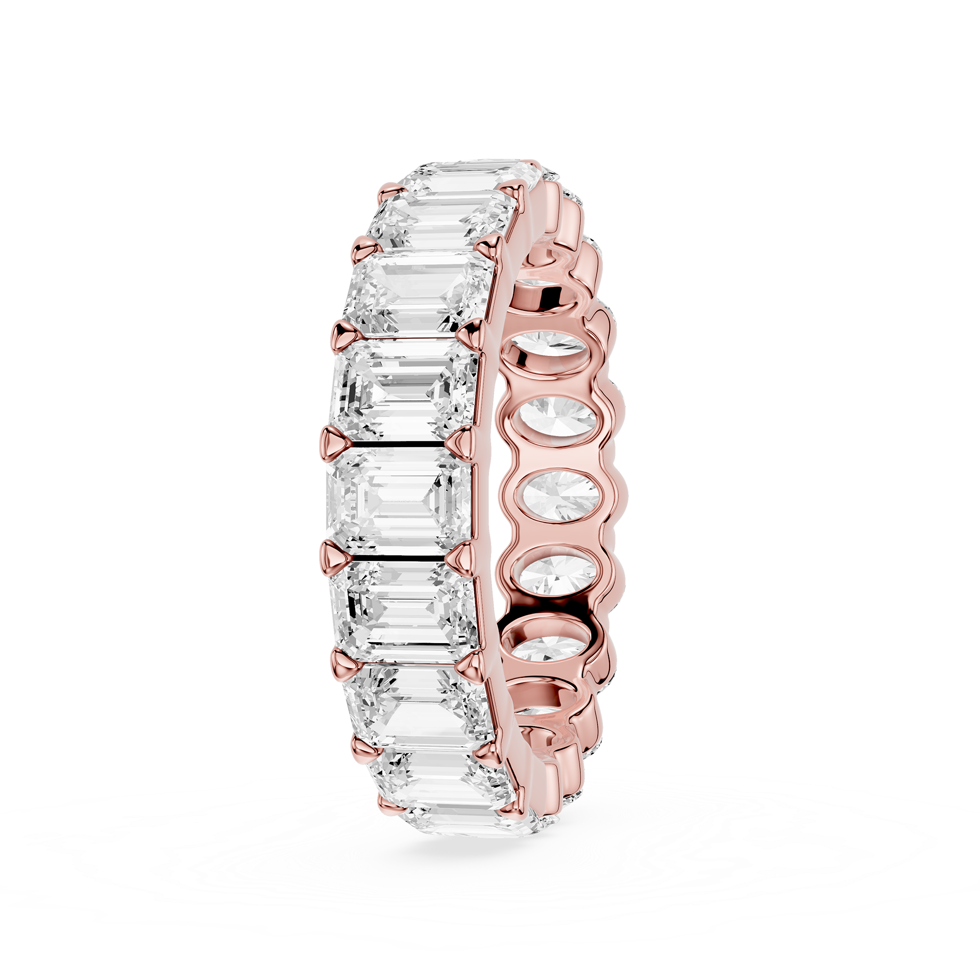 Silver ring with embedded diamonds on a white background