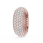 Rose gold and diamond-studded ring on a white background
