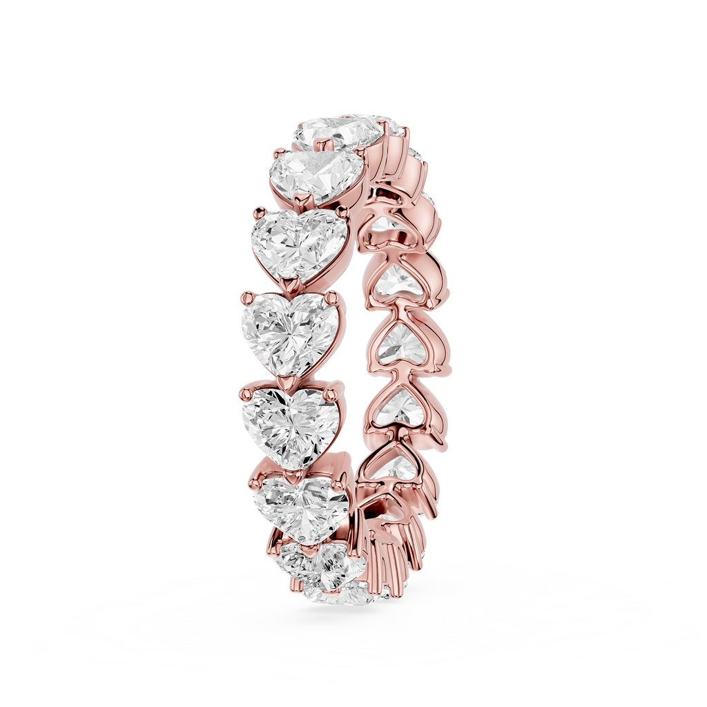 Rose gold earring with heart-shaped diamonds on a white background