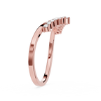 Rose gold ring with small diamonds on a white background