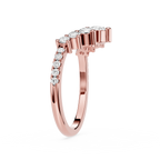 Rose gold ring with diamonds on a white background