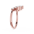Rose gold ring with diamonds on a white background