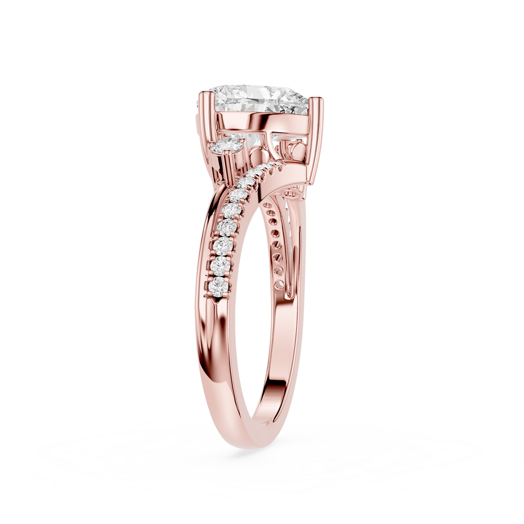A rose gold diamond ring with a round-cut center stone and pavé-set diamonds along the shank, shown on a clean white background.