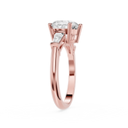 Rose gold ring with a diamond on a white background