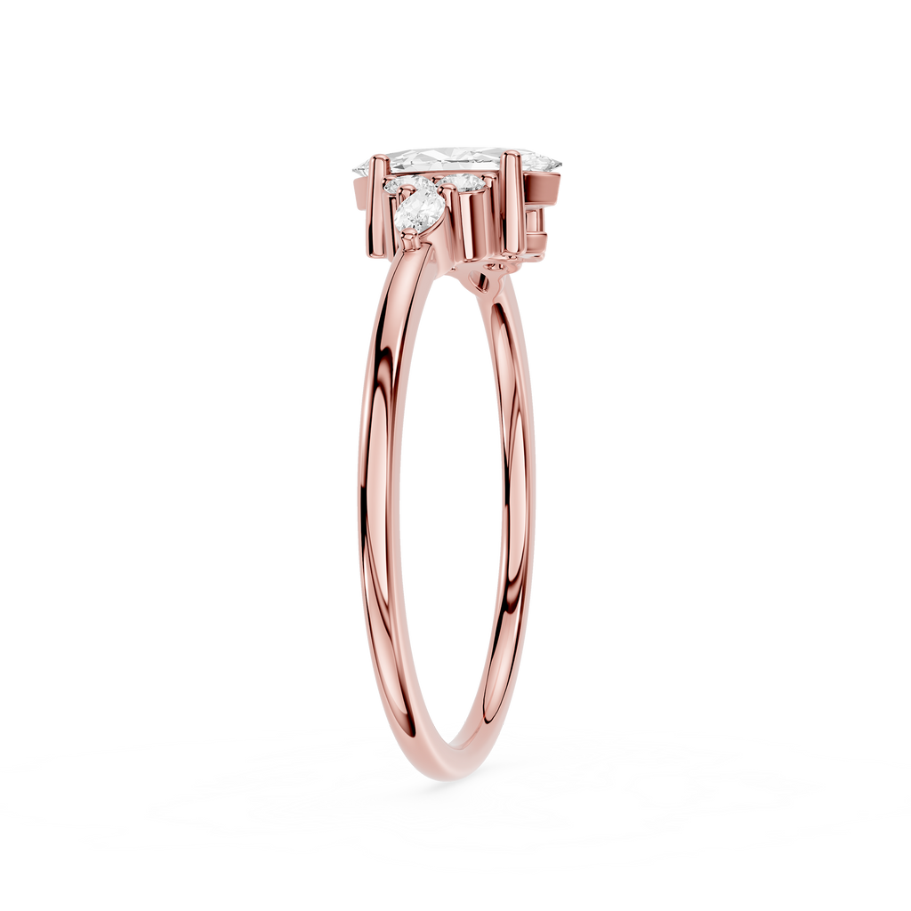Rose gold ring with a diamond on a white background