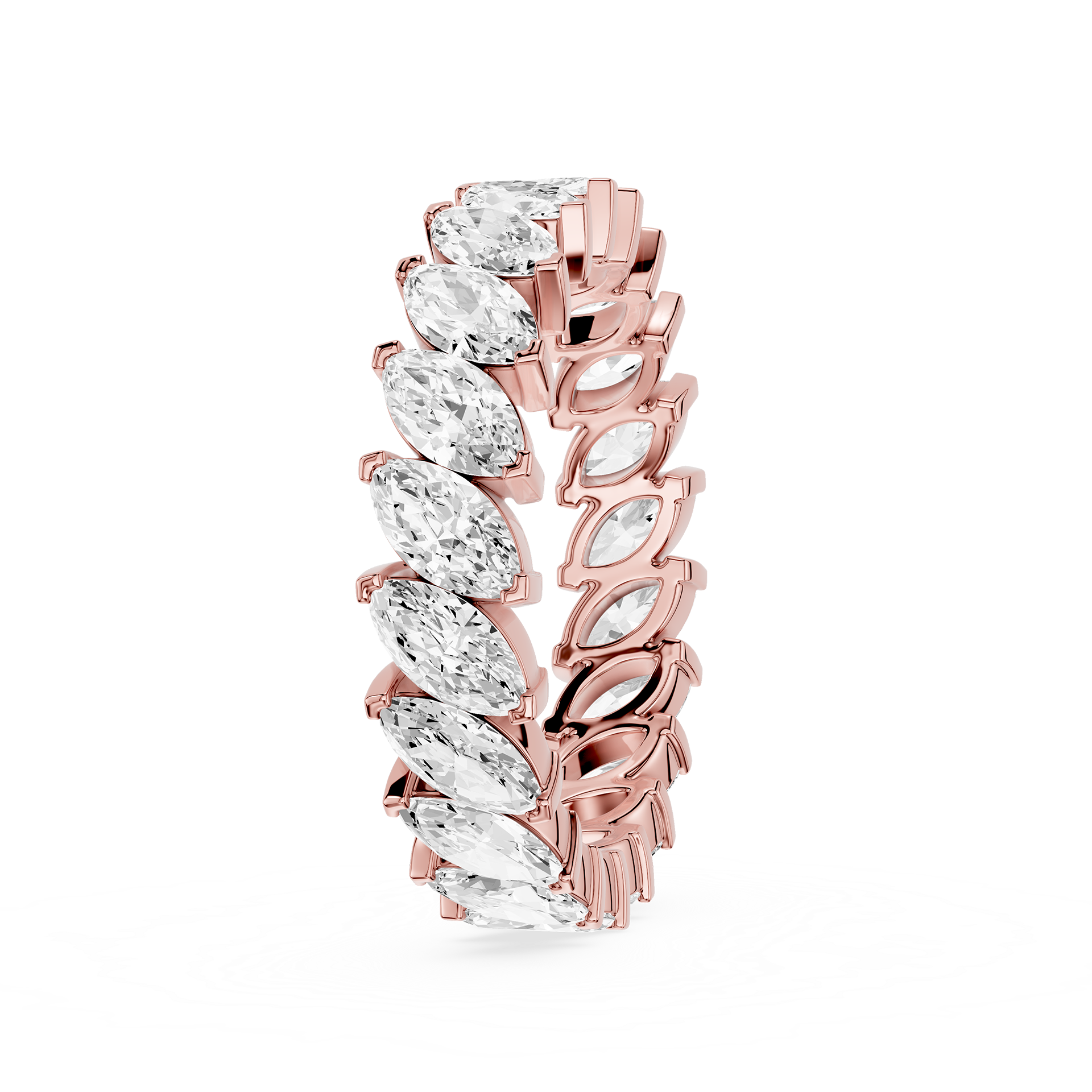 Rose gold and clear gemstone ring on a white background