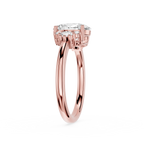 Rose gold ring with a diamond on a white background