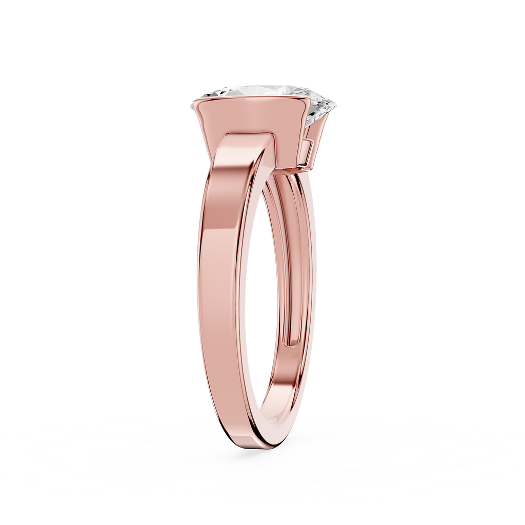 Rose gold ring with a diamond on a white background