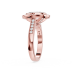 Rose gold ring with diamonds on a white background