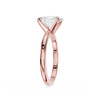 Rose gold ring with a diamond on a white background