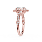 Rose gold ring with diamond accents on a white background