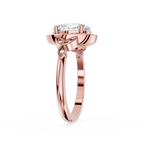Rose gold ring with a diamond on a white background