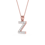 Rose gold necklace with a 'Z' shaped pendant on a white background